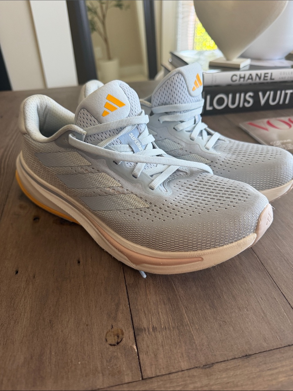 adidas Women’s Light Blue Running Sneakers with Yellow Logo